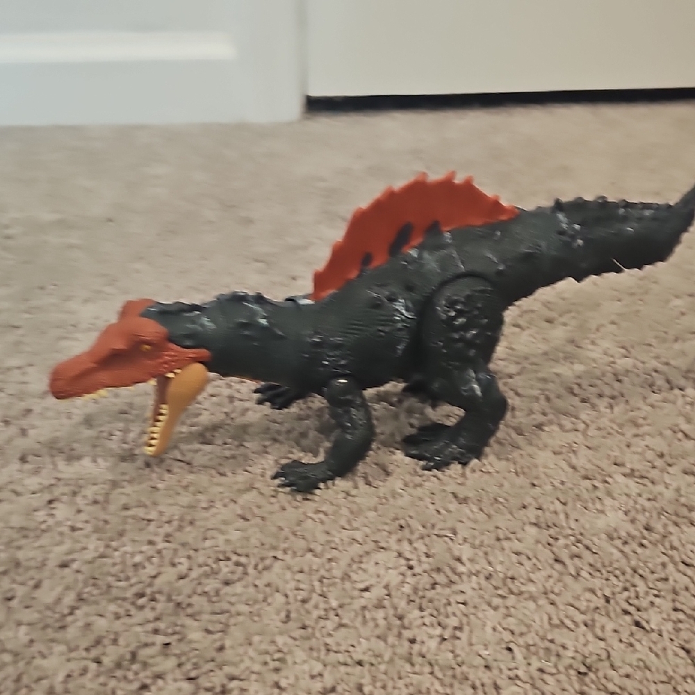 Reptile Toy with Orange and Black Design